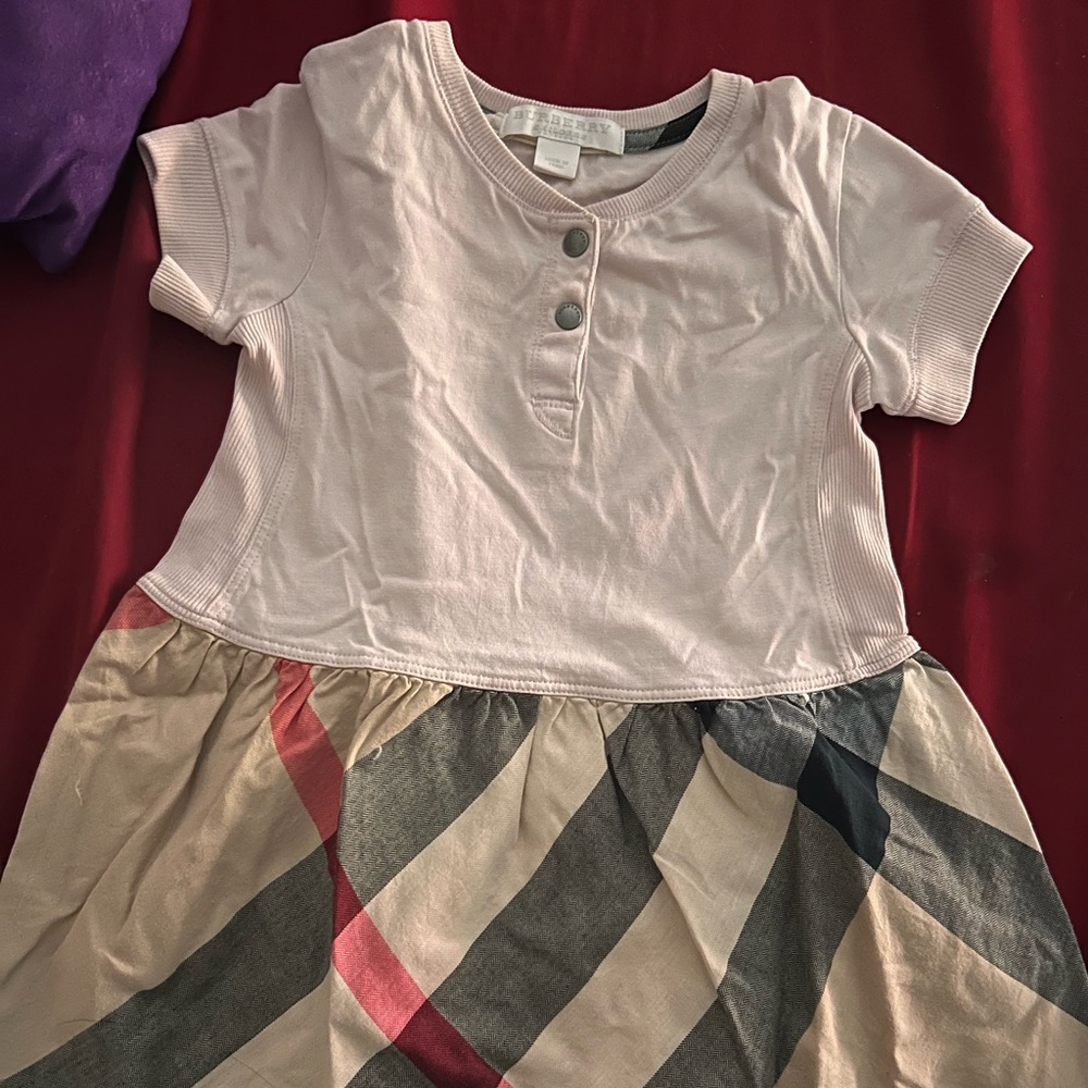 Authentic Burberry dress size 2 and good condition.